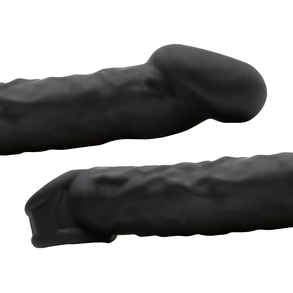 Black textured silicone dildo with rounded head and tapered base from oxballs muscle ripped velvet-smooth night series