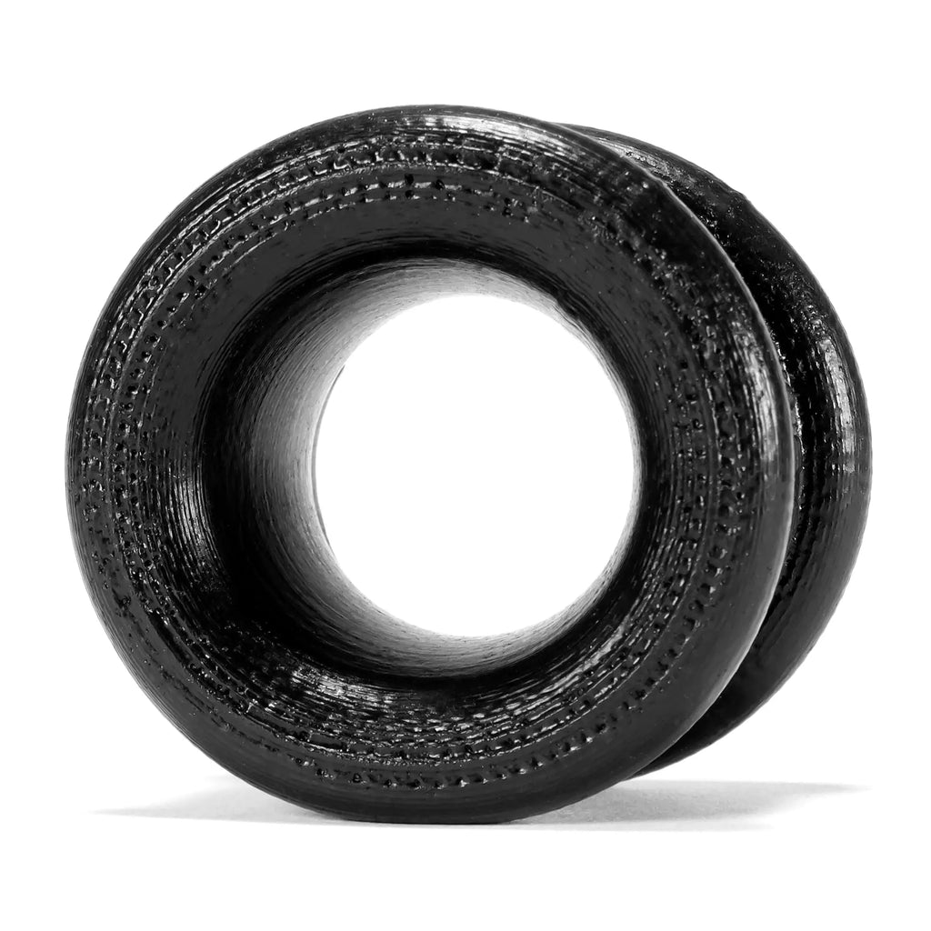 Black textured rubber oxballs neo short ballstretcher with glossy finish and visible tread pattern