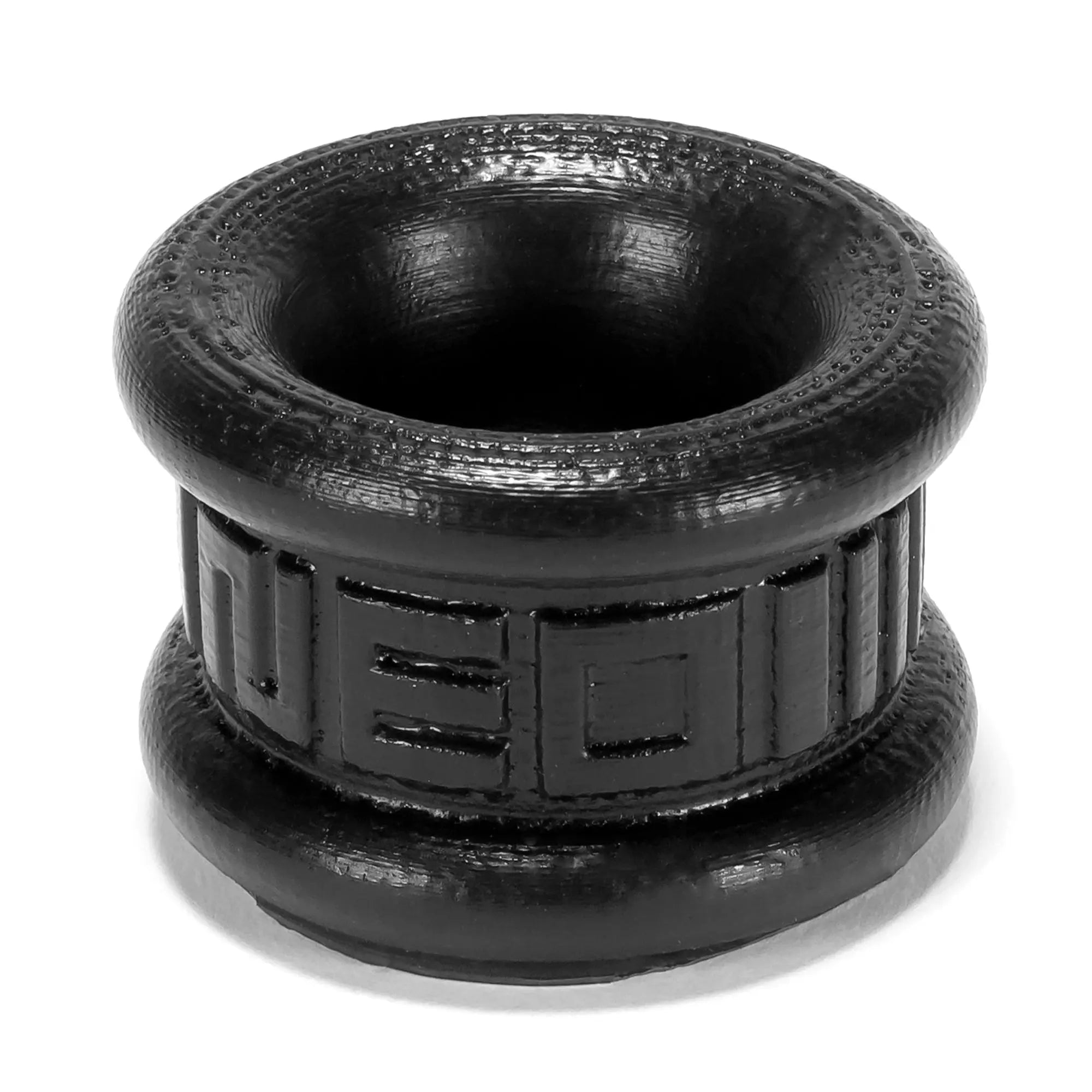 Black textured silicone oxballs neo short ballstretcher with embossed neo lettering and ribbed design