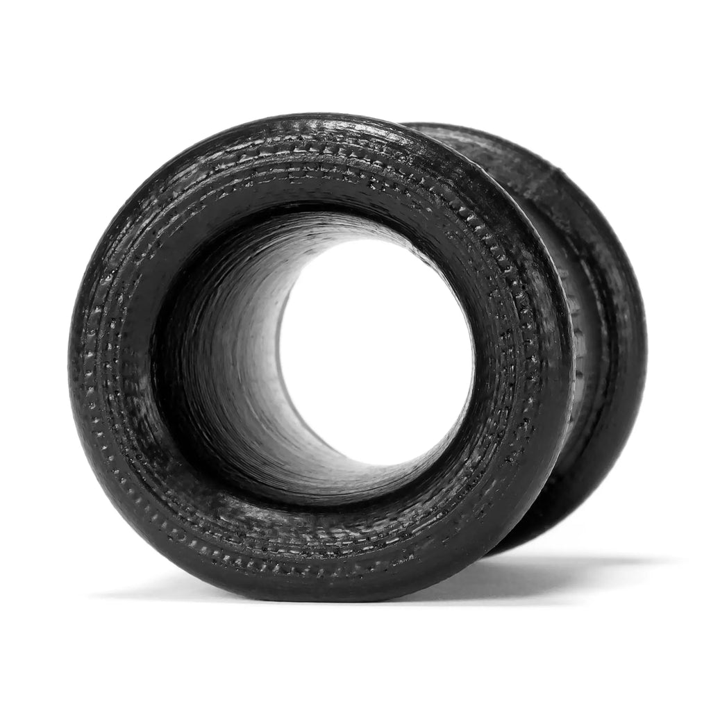 Black carbon fiber oxballs neo tall ballstretcher tunnel plug with textured ribbed exterior and smooth bore
