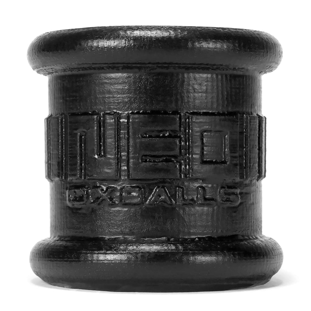 Oxballs neo tall ballstretcher black cylindrical design with embossed branding and textured surface for comfort