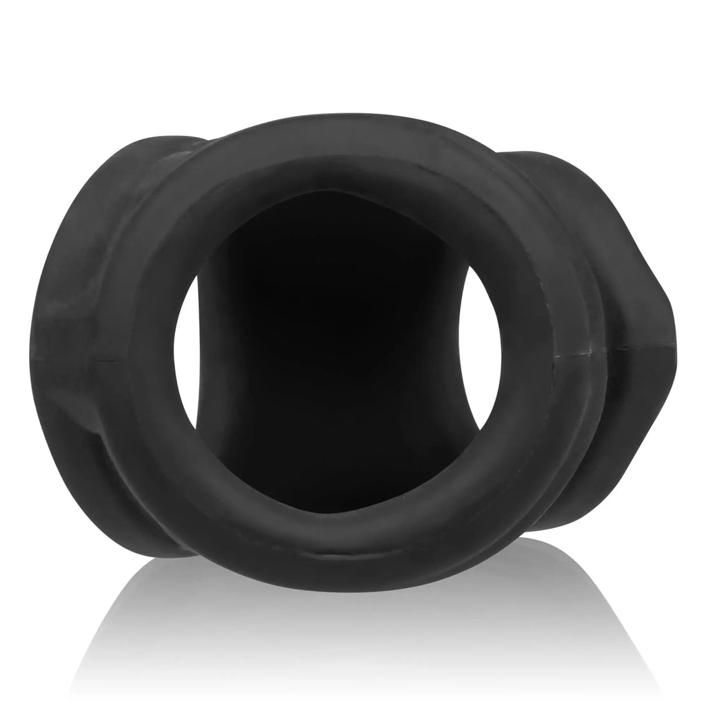 Black silicone OxBalls Oxsling cocksling with central opening and textured outer edges in black ice color