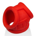 Red silicone OxBalls Oxsling cocksling with textured geometric design for comfortable secure wear