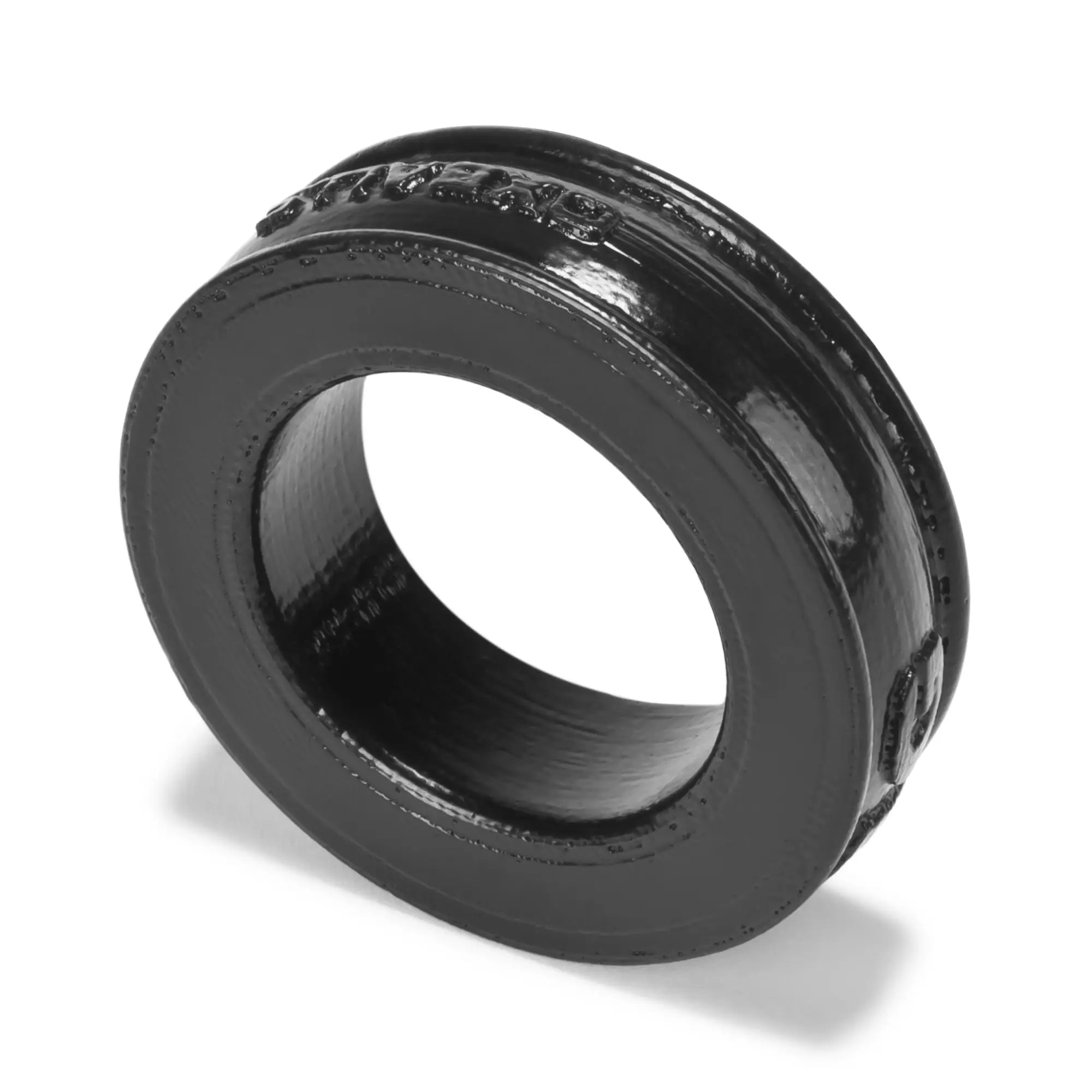 Black oxballs pig ring cockring with glossy finish embossed detailing and slightly textured surface