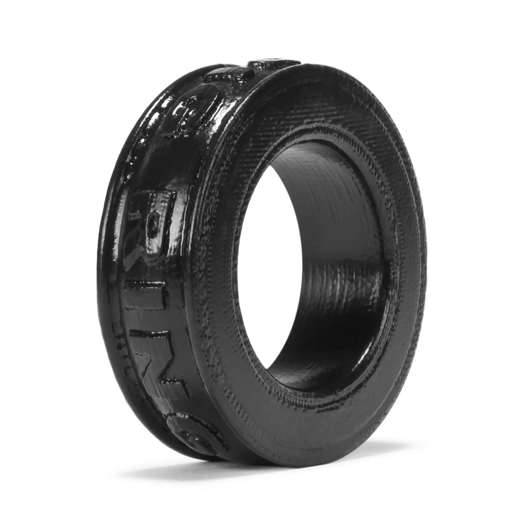 Oxballs pig ring cockring black glossy finish with embossed tire tread pattern and visible 3d printed texture