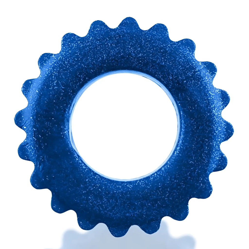 A vibrant blue glittery oxballs plushy ring with a serrated edge and central hole in one size