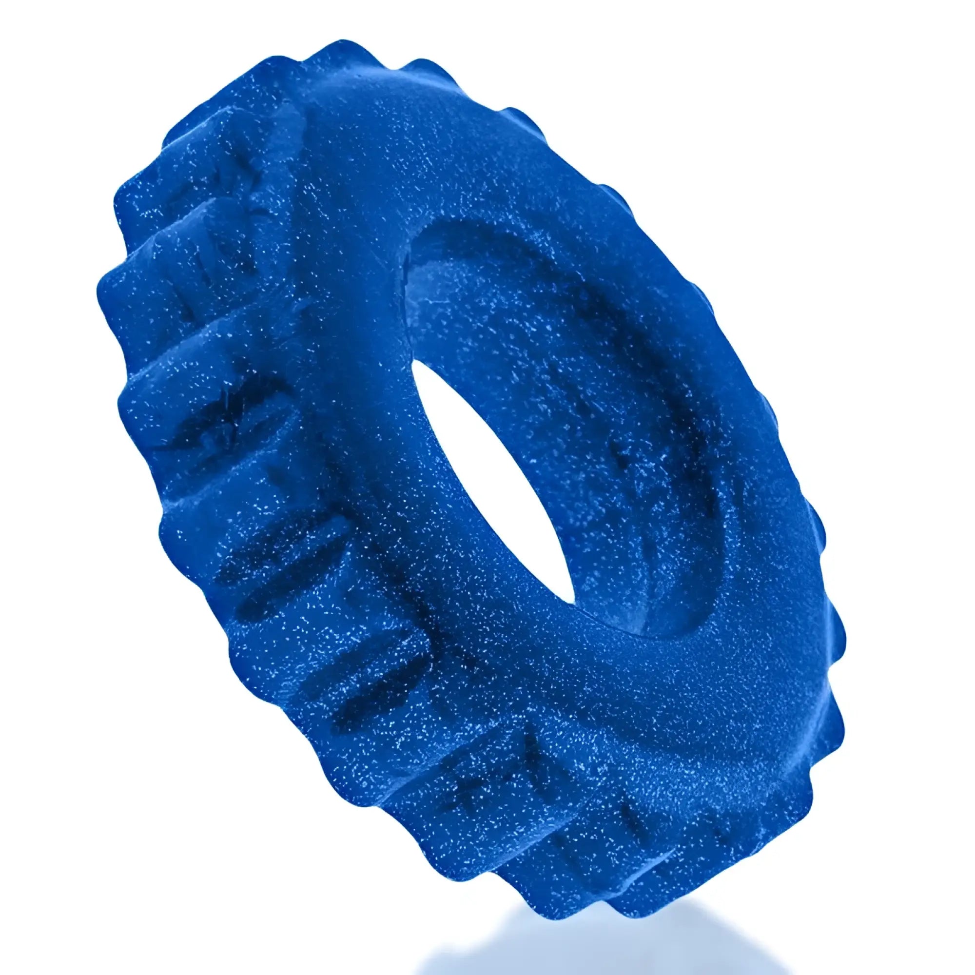 A vibrant blue glittery silicone OxBalls plushy ring with a textured gear-like outer edge in one size