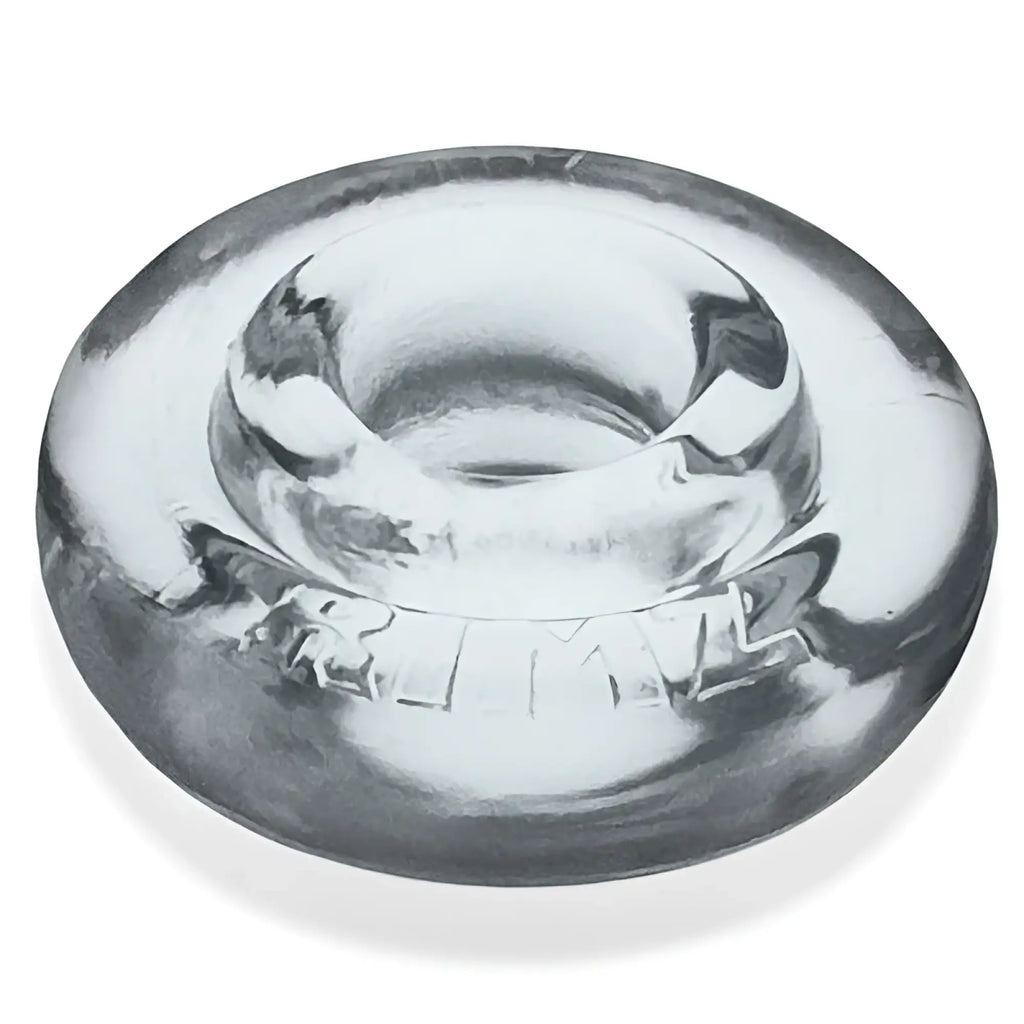 Clear glass ashtray with central circular depression and embossed lettering featured in oxballs rimz big ring clear