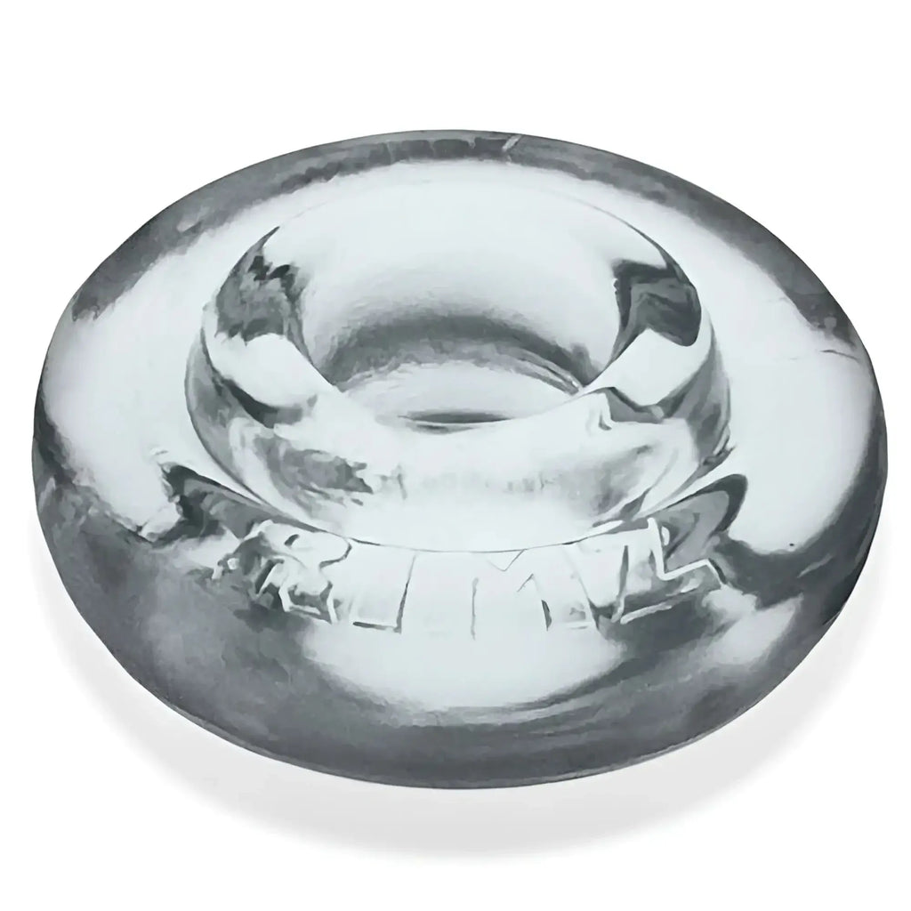 Clear glass ashtray with central circular depression and embossed lettering featured in oxballs rimz big ring clear