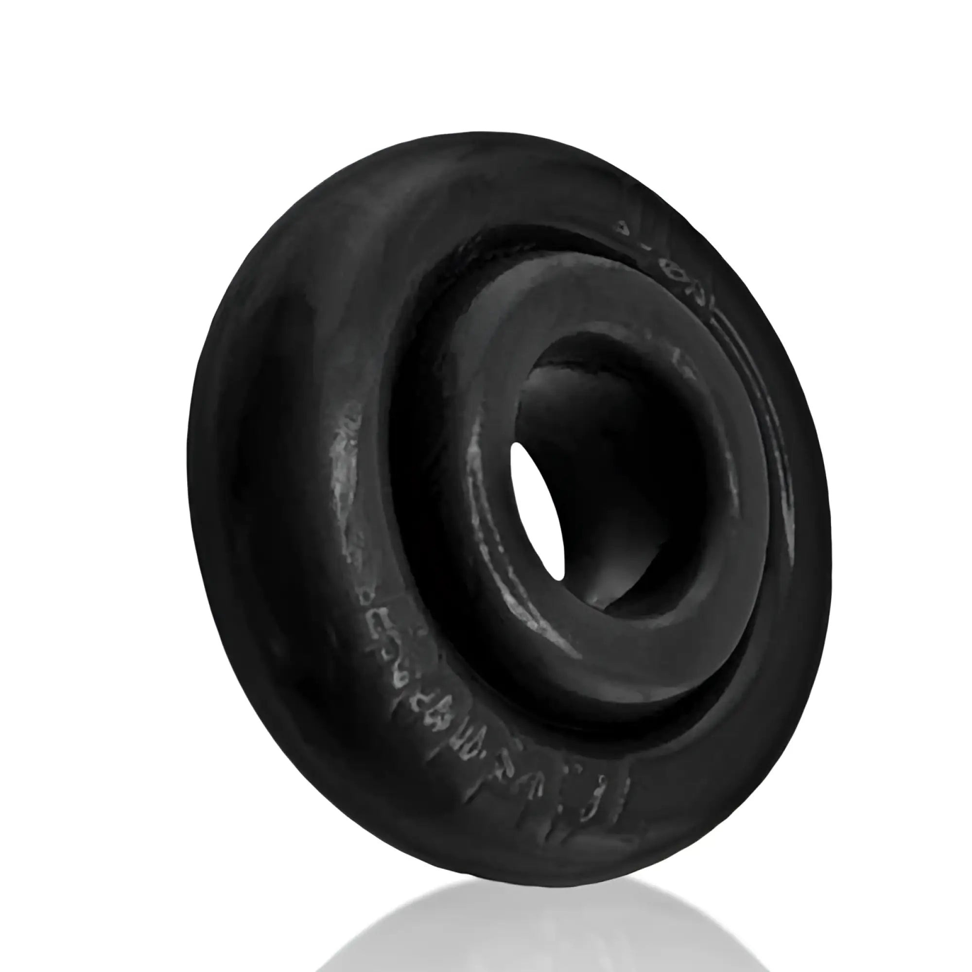 Black rubber OxBalls Rimz Ring with central hole and engraved markings on outer rim in one size