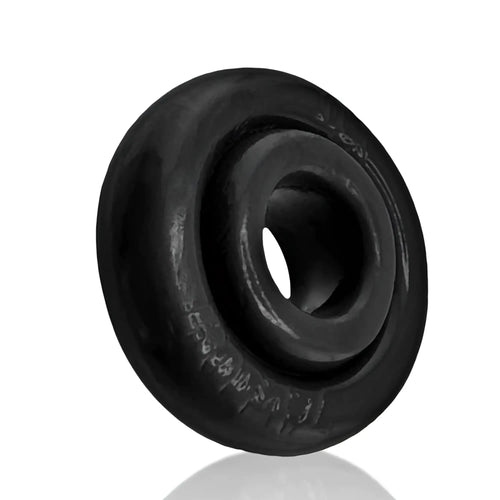 Black rubber OxBalls Rimz Ring with central hole and engraved markings on outer rim in one size
