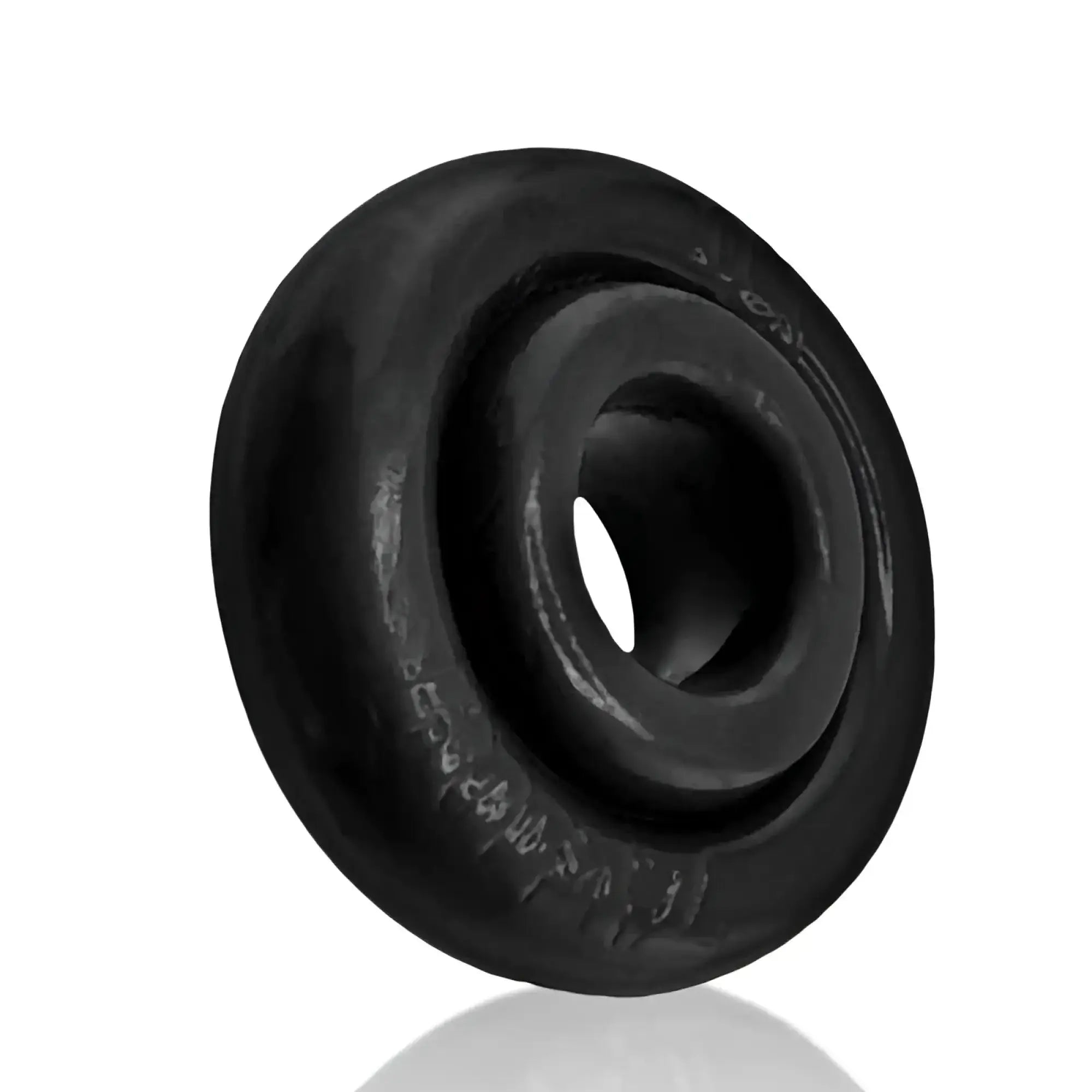 Black rubber OxBalls Rimz Ring with central hole and engraved markings on outer rim in one size