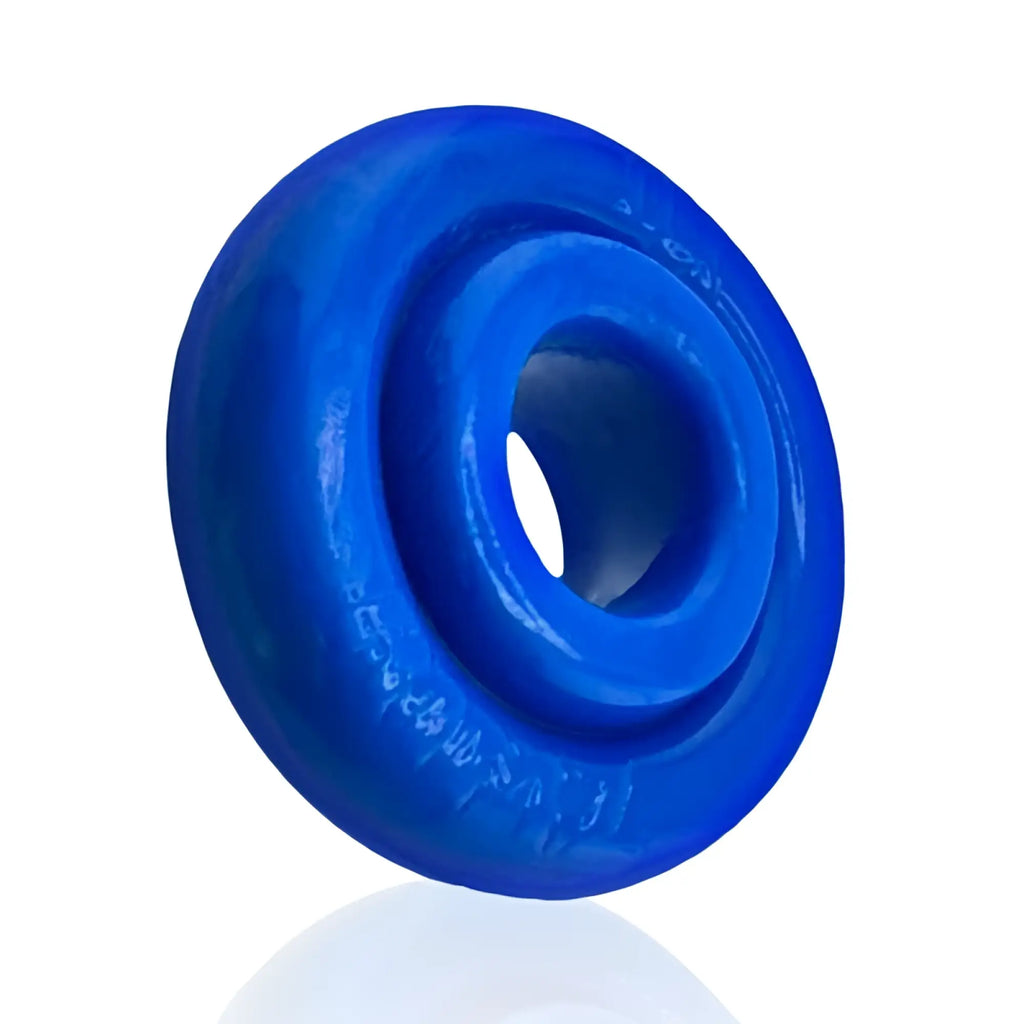 Bright blue glossy silicone OxBalls Rimz ring with central hole and embossed text around outer edge one size fits all