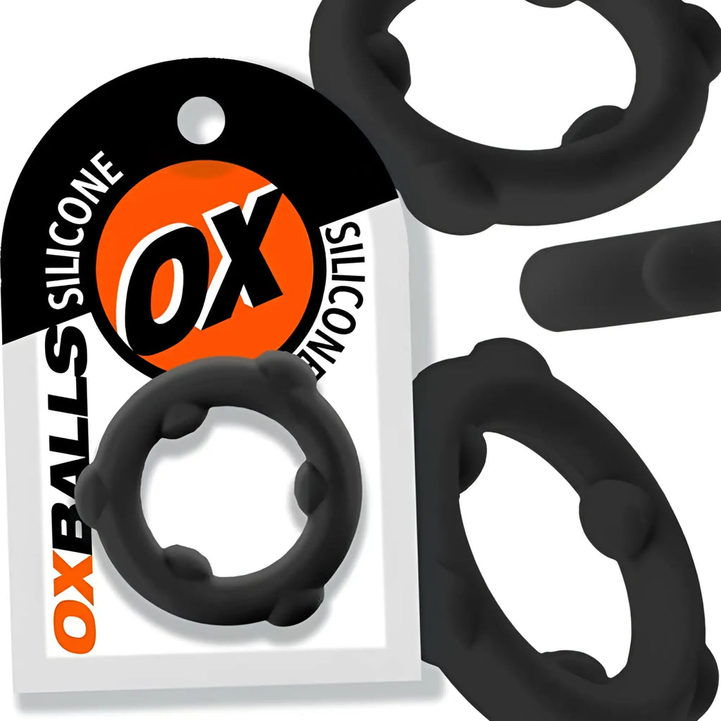 Black oxballs spinner silicone ring featuring textured rounded protrusions in durable black silicone material