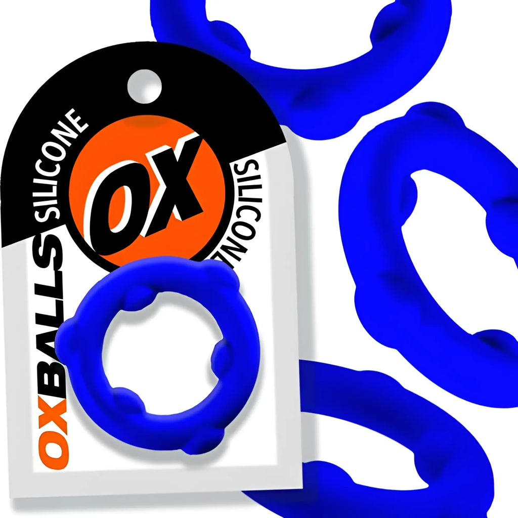Blue oxballs spinner silicone ring with textured bumpy surface in vibrant blue color for enhanced grip and comfort