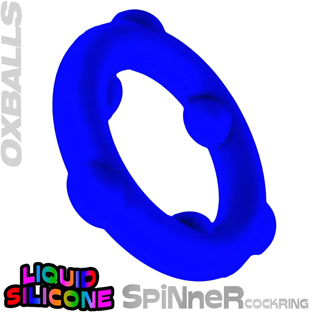 A vibrant blue flexible silicone cockring with smooth rounded design and subtle textured ridges by OxBalls