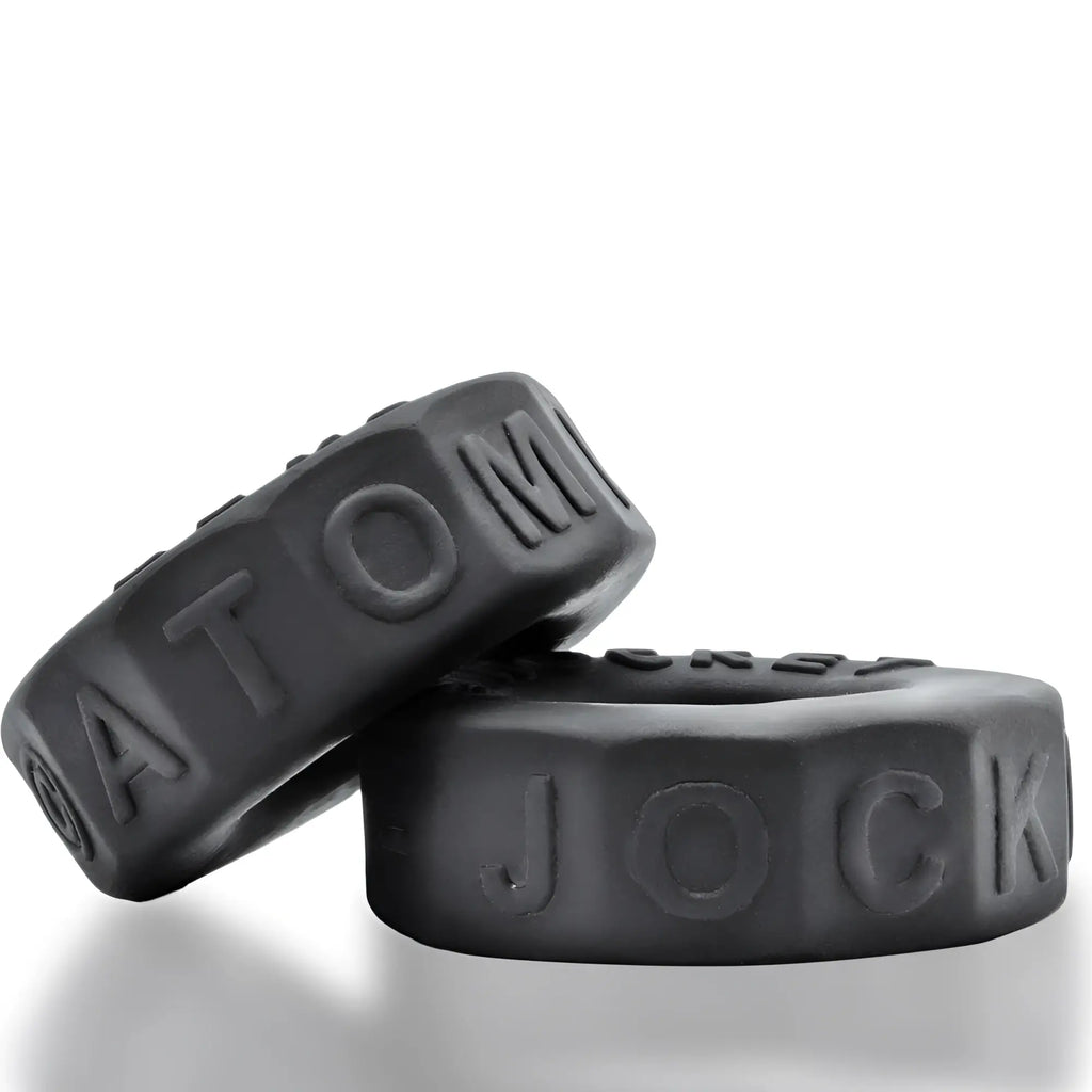 Black silicone oxballs sprocket comfort no-roll cock ring with embossed lettering for night use