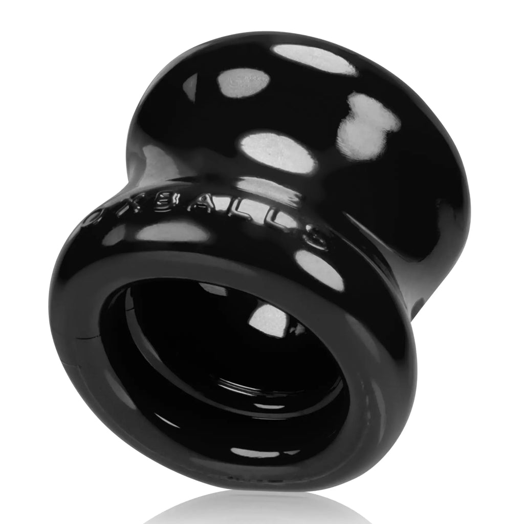 Black glossy silicone anal plug with sallo engraved on the ring for oxballs squeeze ball stretcher black