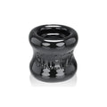 Black glossy silicone squeeze ring with embossed oxballs branding for ball stretcher use
