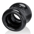 Black glossy silicone anal plug with textured skull design on rounded end oxballs squeeze ballstretcher night