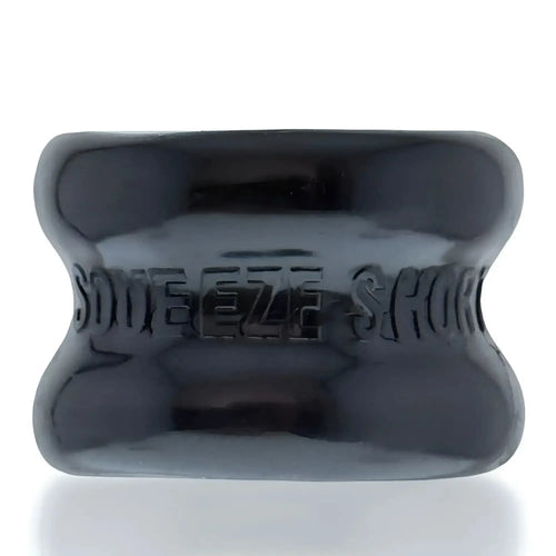 Black glossy silicone bone-shaped ballstretcher by oxballs with embossed squeeze shot text one size