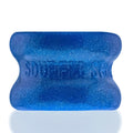A vibrant blue glittery silicone bone-shaped squeeze toy with embossed text from oxballs squeeze short ballstretcher
