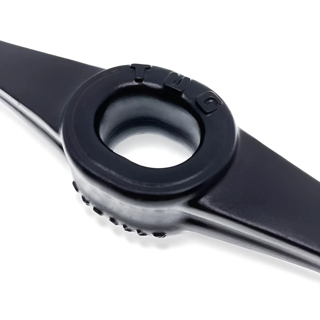 Oxballs tug pull down ballstretcher black showing black plastic tig welding torch tip with circular hole and textured grip