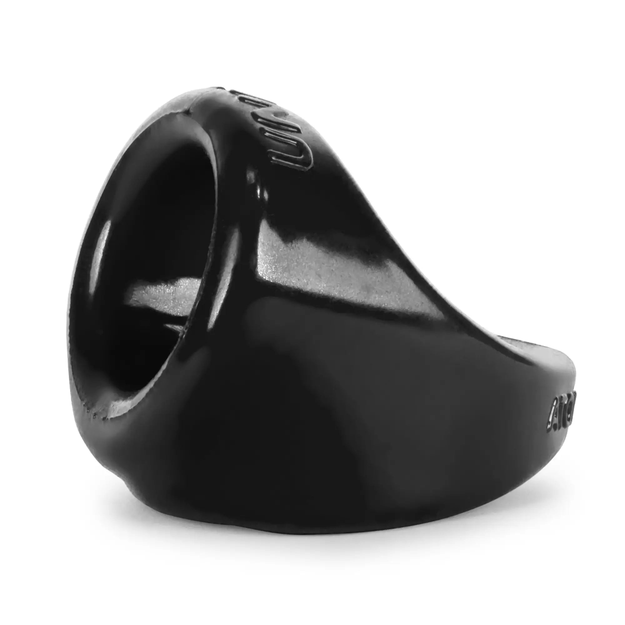 Black glossy finish oxballs unit x cocksling ring with wide band and embossed inner lettering visible