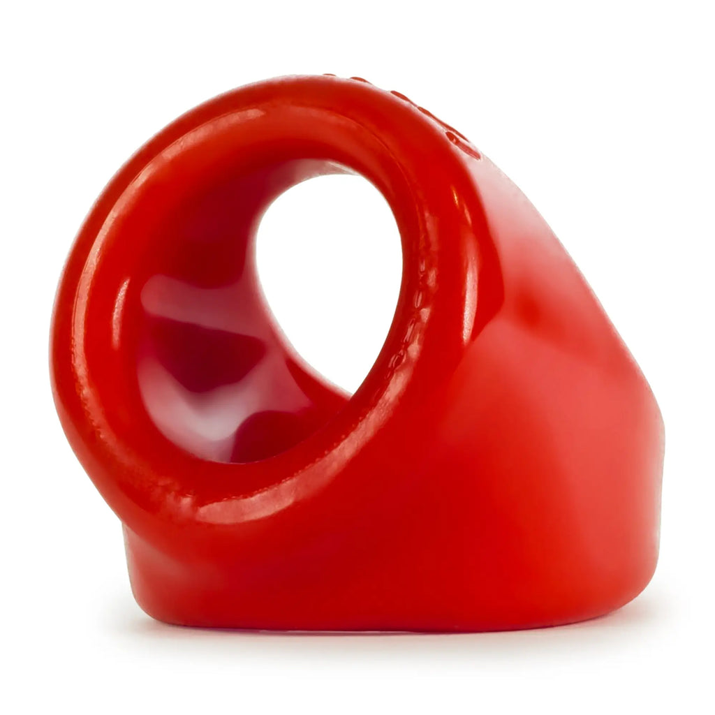 Vibrant red oxballs unit x cocksling silicone ring with smooth glossy finish and oval shaped opening
