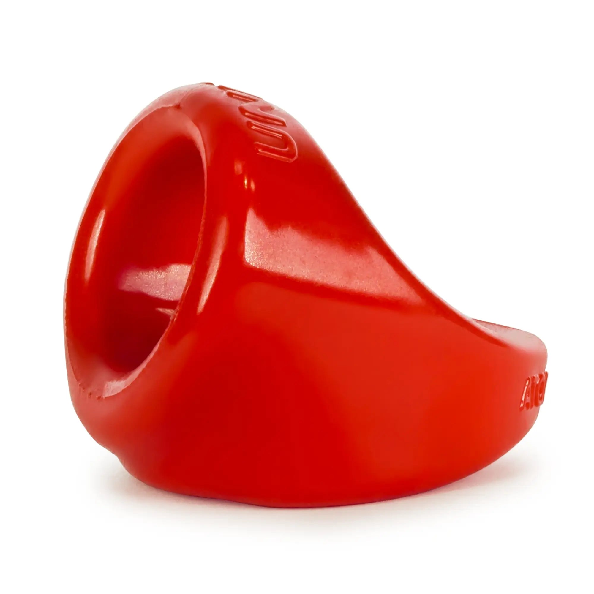 Vibrant red oxballs unit x cocksling silicone ring with smooth glossy finish and embossed branding on the sides