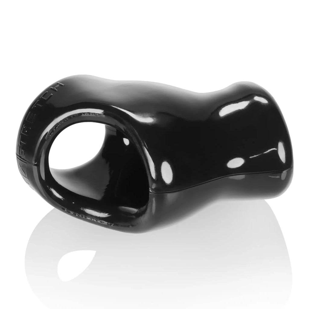 Black glossy ceramic k-stretch ring with smooth ergonomic design and embossed oxballs branding in unit x stretch cocksling
