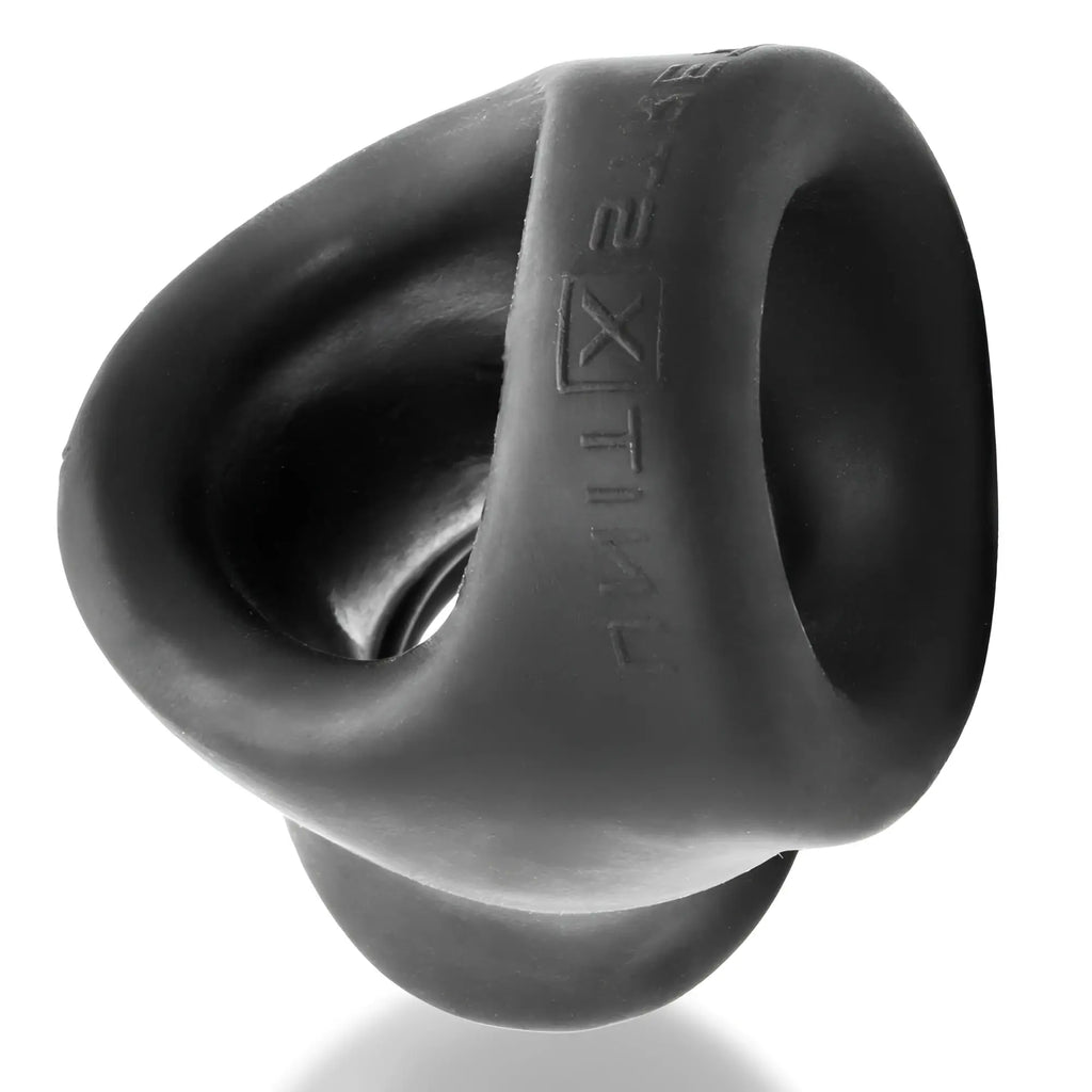 Black silicone cock ring with embossed oxballs brand name for ball stretch in unit-x stretch tug-down design