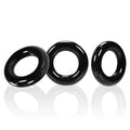 Three sleek black silicone OxBalls Willy Rings with a glossy finish designed for comfortable wear