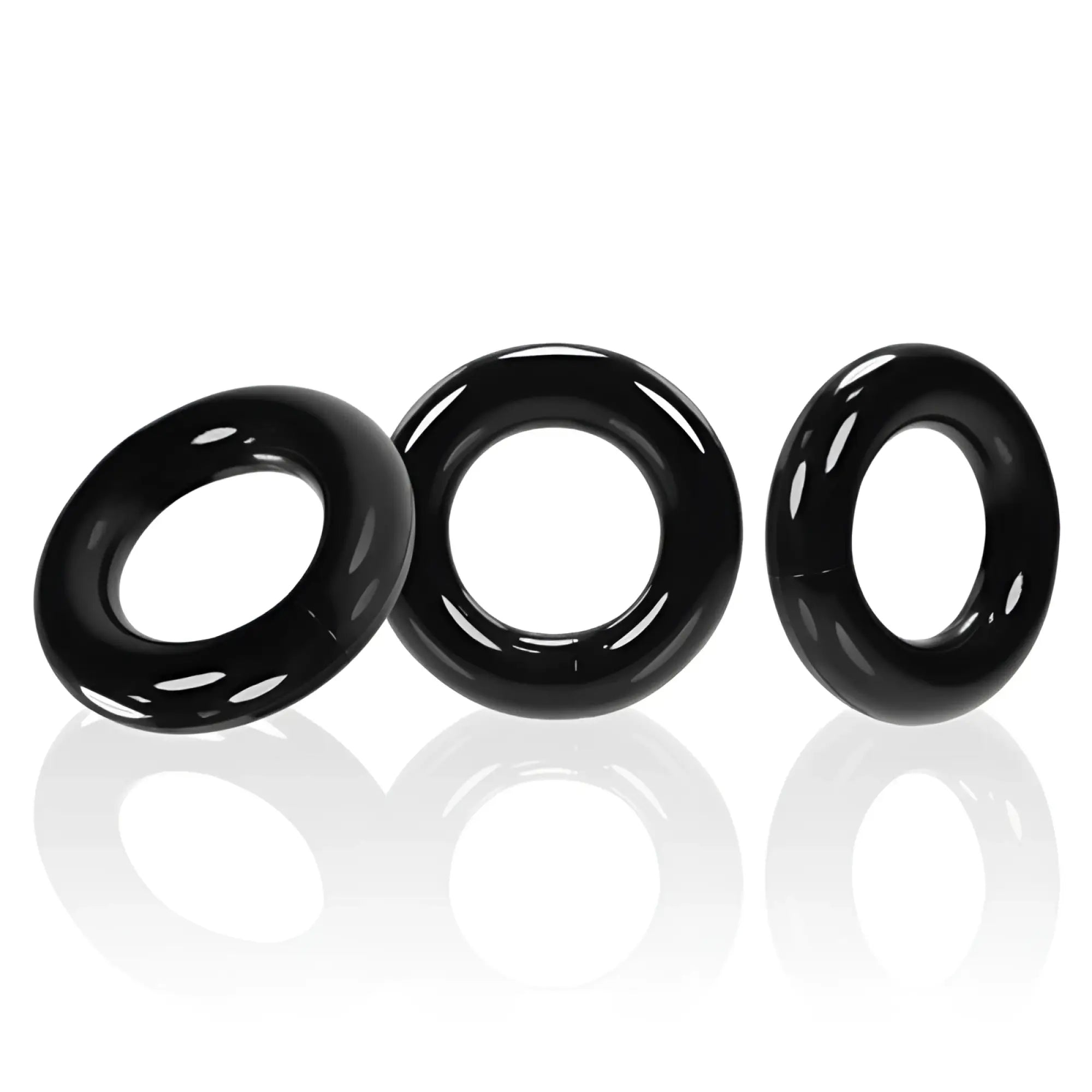 Three sleek black silicone OxBalls Willy Rings with a glossy finish designed for comfortable wear