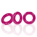 Three vibrant hot pink OxBalls Willy Rings made of glossy silicone designed for male enhancement