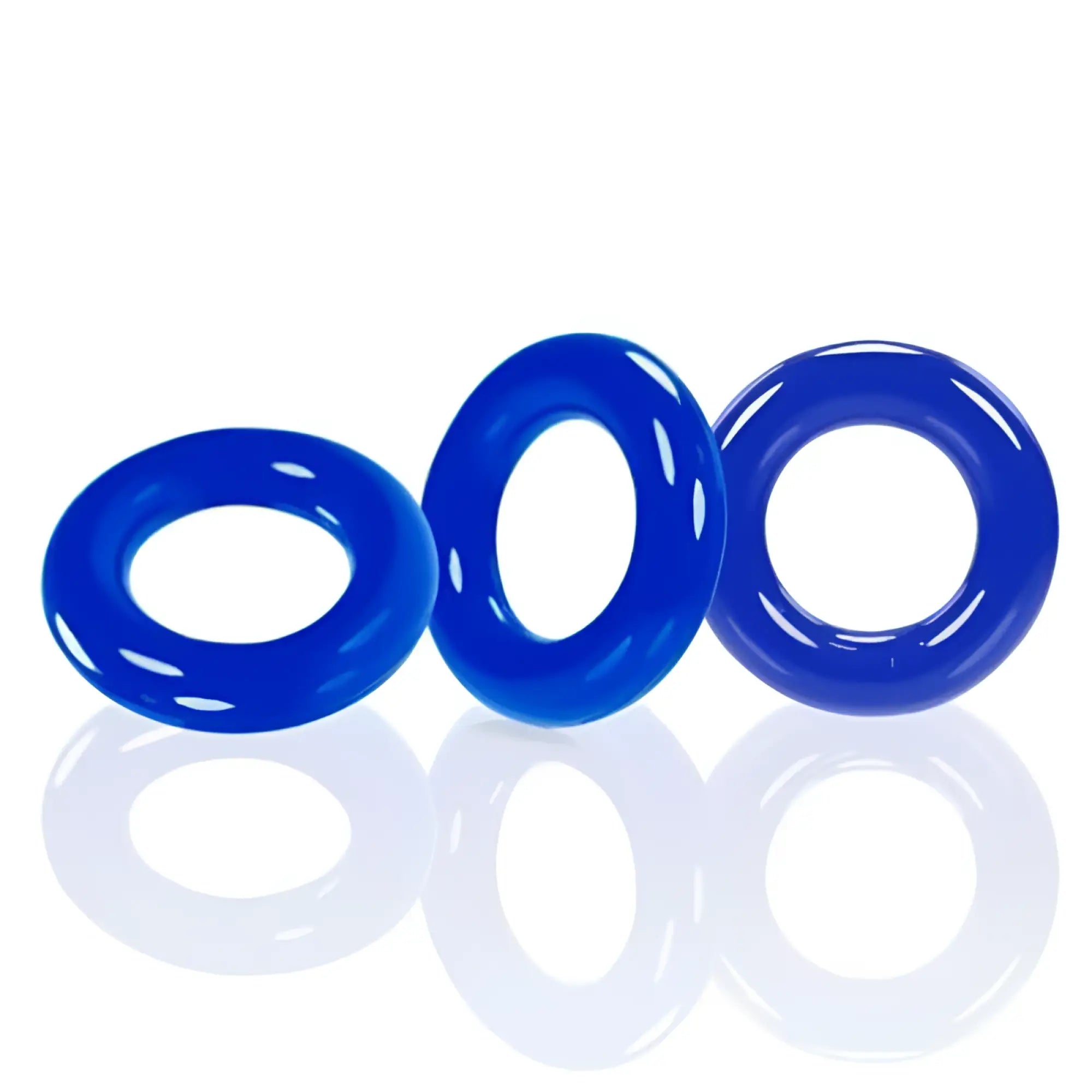 Three vibrant blue glossy silicone oxballs willy rings arranged in a row for comfortable wear and durability