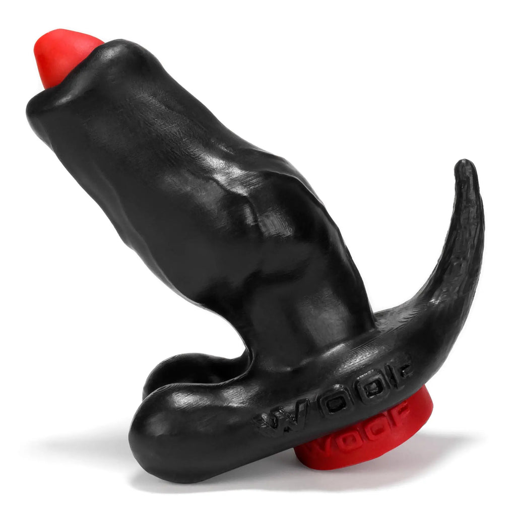 Black silicone anal plug with red tip and base branded vogue oxballs woof hollow plug with stopper in black and red