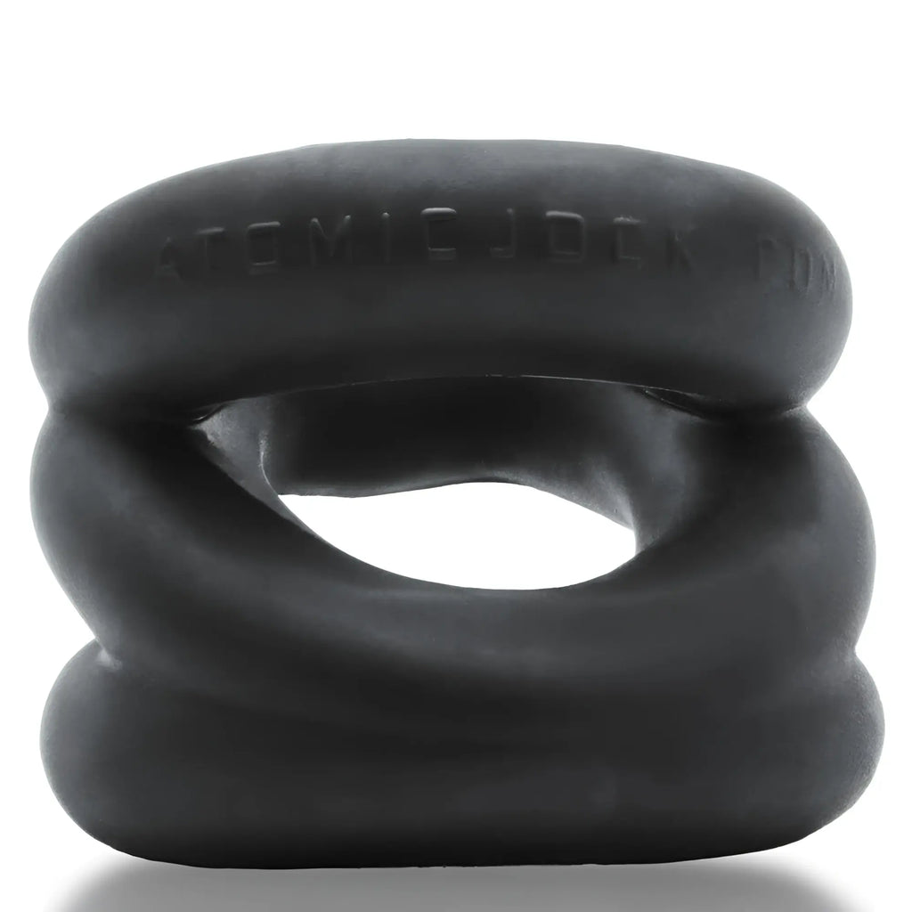 Black silicone oxballs z-balls zig-zag cock ring with textured segmented design and atomic jock branding visible