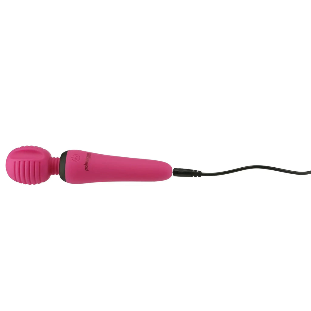 Pink silicone wand with textured head and black cord palmPower groove mini wand fuchsia for personal massage