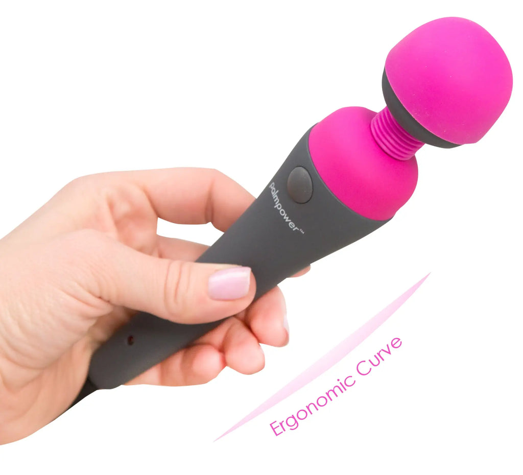 Pink and black ergonomic palmpower massage wand with smooth rounded head for effective muscle relief