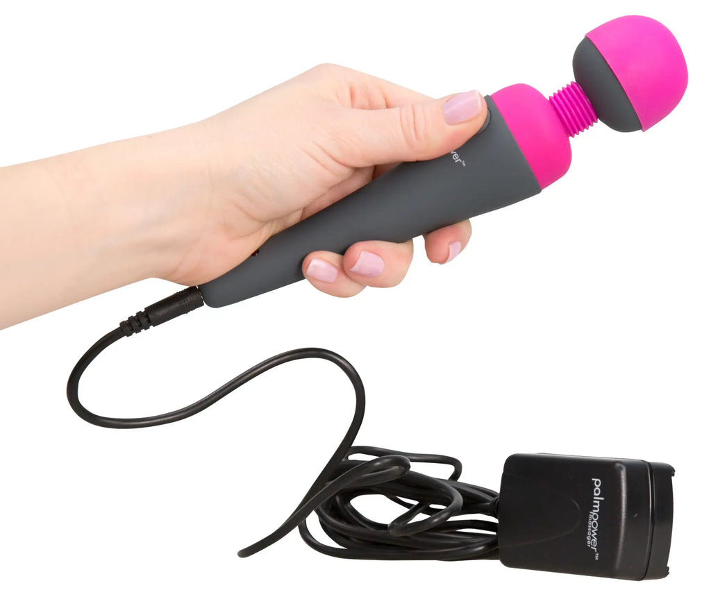 Pink and black palmpower massage wand with textured grip and rounded head for targeted stimulation