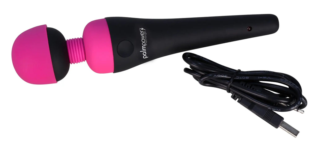 Pink and black palmPower massage wand with textured grip silicone head and usb charging cable shown from the back side