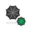 Black spiderweb-shaped glow in the dark sticker with white web pattern and glowing green version for peekaboo pasties