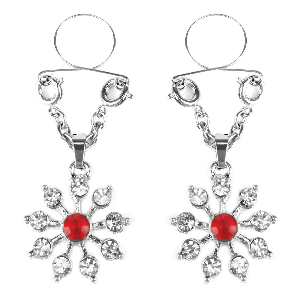 Silver snowflake-shaped nipple clamps with a central red gemstone and clear crystals from peekaboo pasties ruby and diamond star nipple jewellery