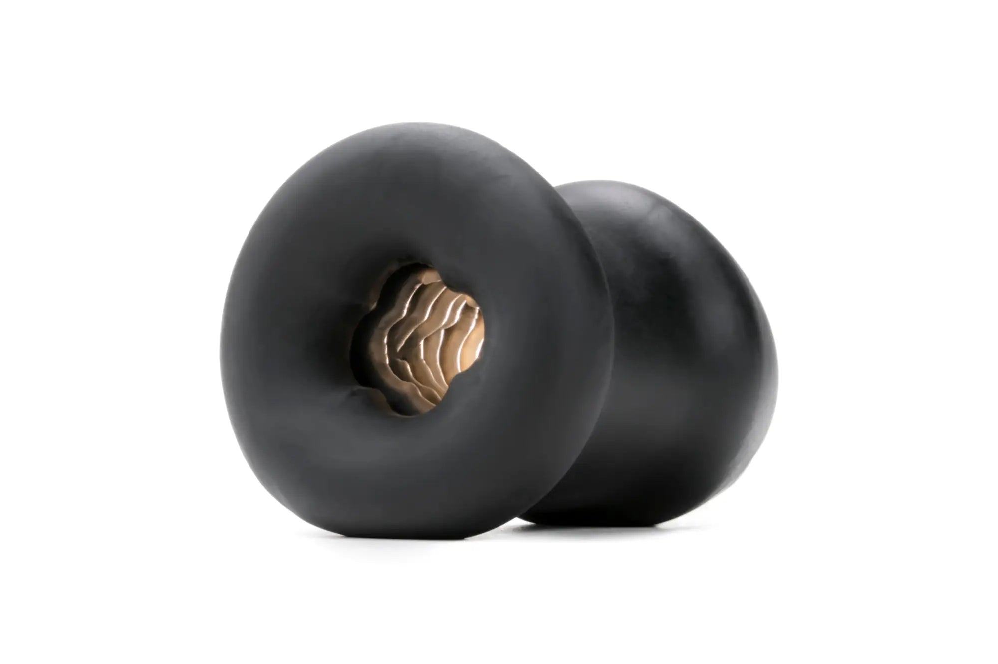 Black rubber earplugs with textured golden brown core designed for PerfectFit Buck Angel Buck Off FTM Stroker use