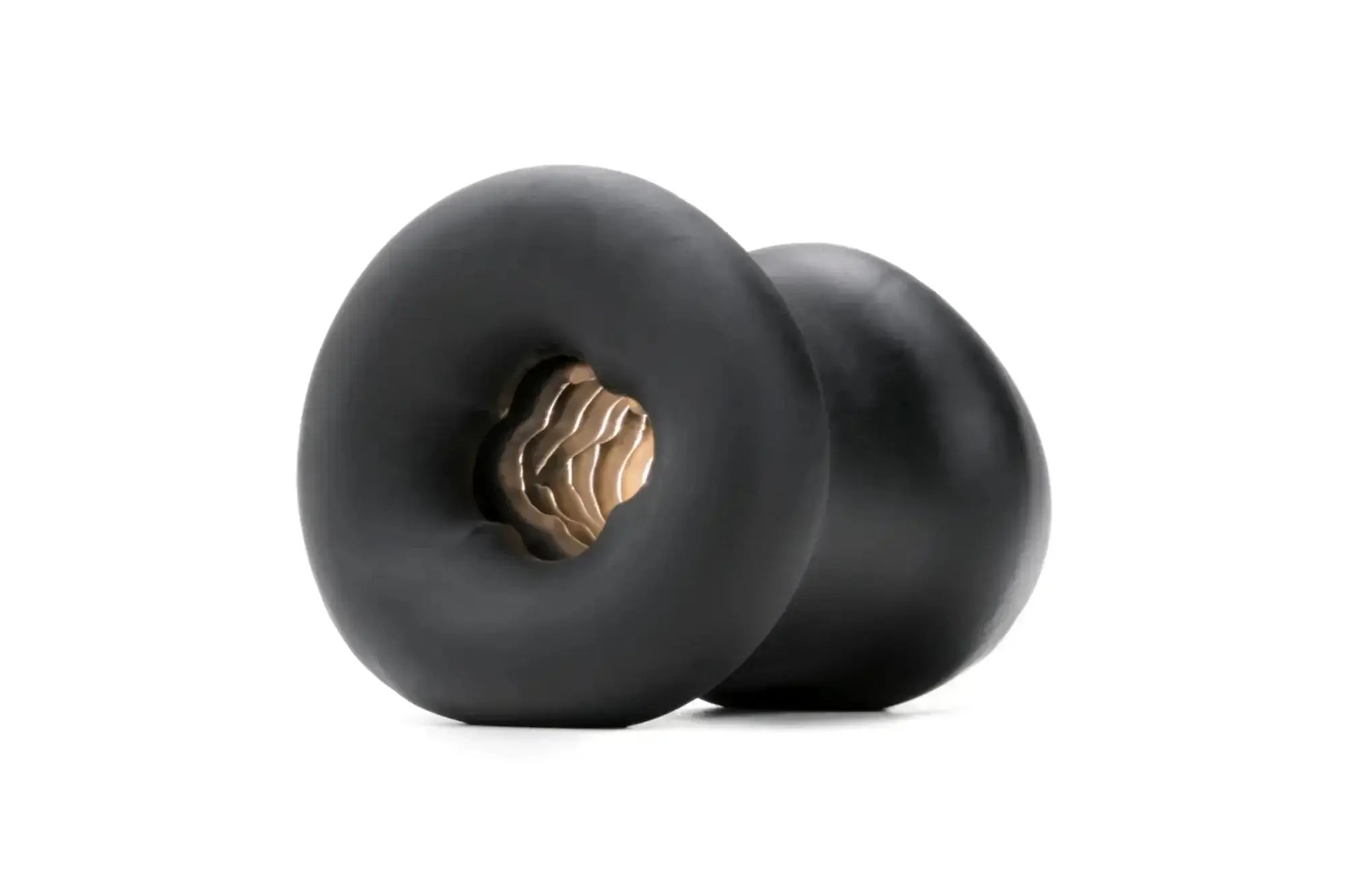 Black rubber earplugs with textured golden brown core designed for PerfectFit Buck Angel Buck Off FTM Stroker use