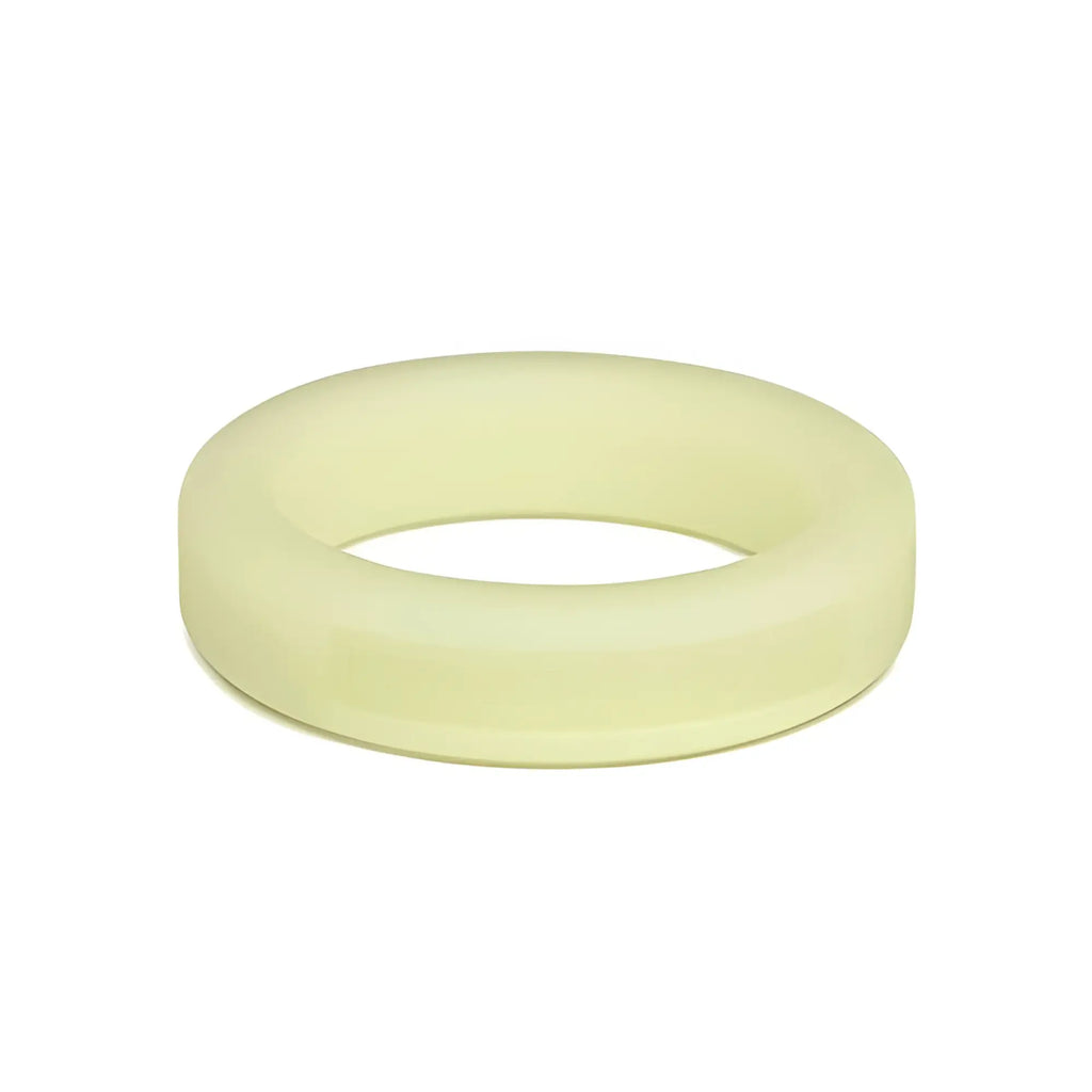 A pale yellow smooth-textured perfectfit classic silicone medium stretch penis ring 36mm glow in the dark rubber ring