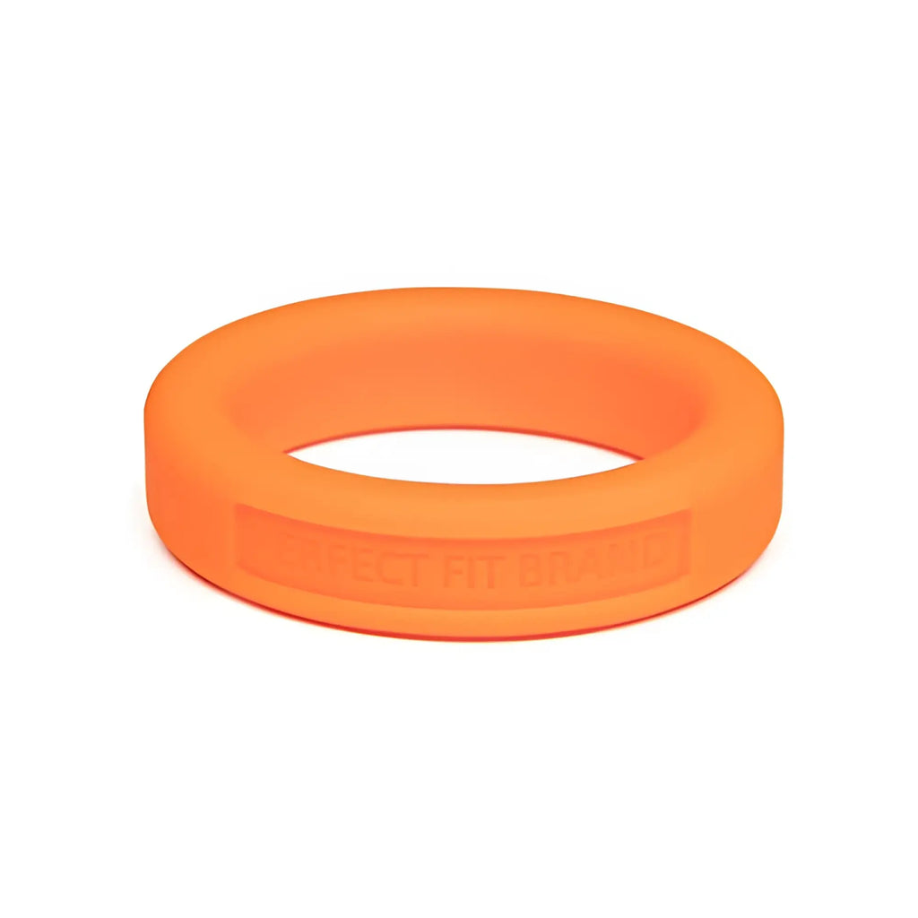 Bright orange perfectfit classic silicone medium stretch penis ring with smooth rounded design and embossed text