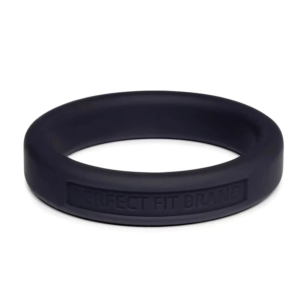 Black silicone perfectfit classic medium stretch penis ring 44mm showing embossed brand on inner band