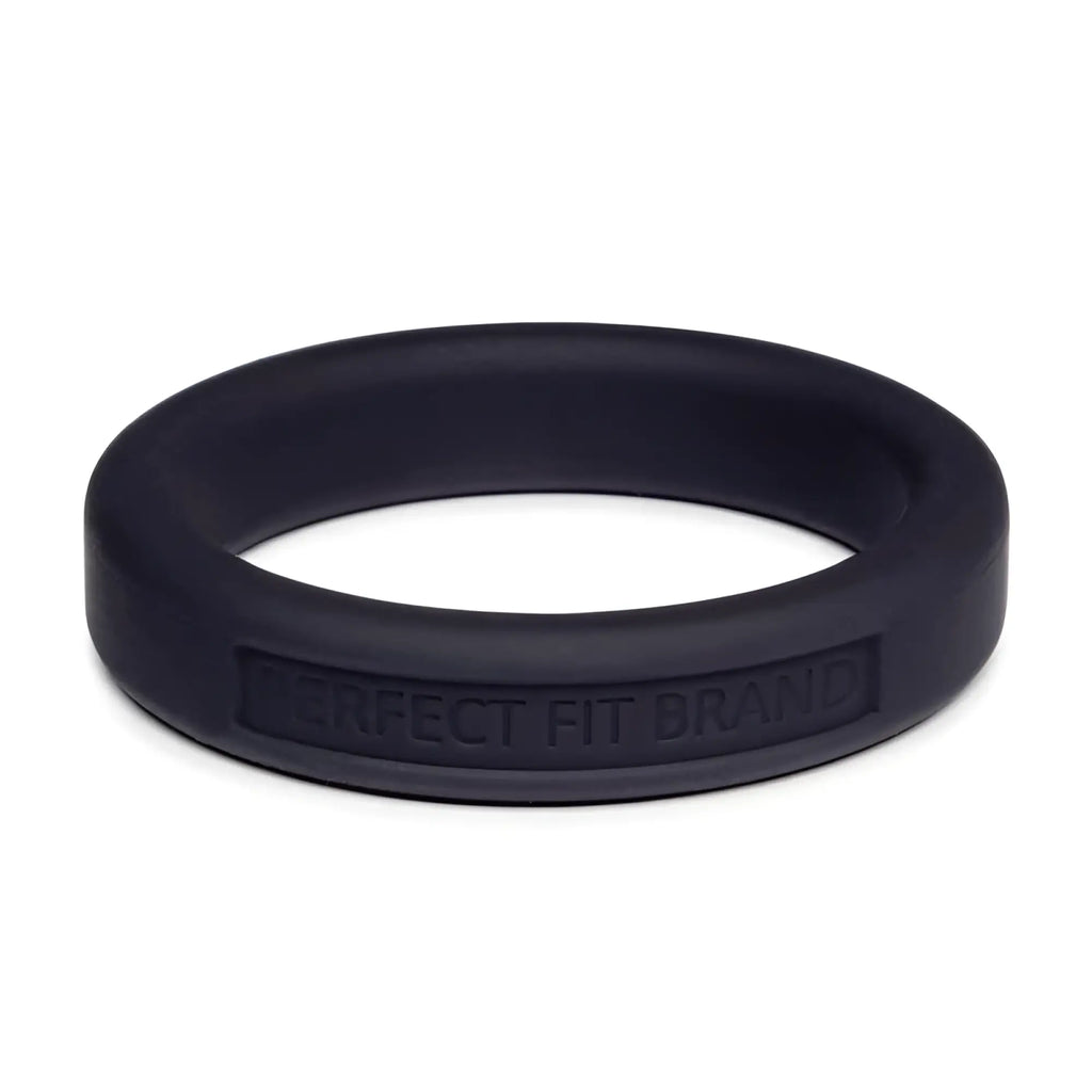 Black silicone perfectfit classic medium stretch penis ring 44mm showing embossed brand on inner band